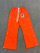 SAINT VANITY sporty casual straight-leg button-down pants