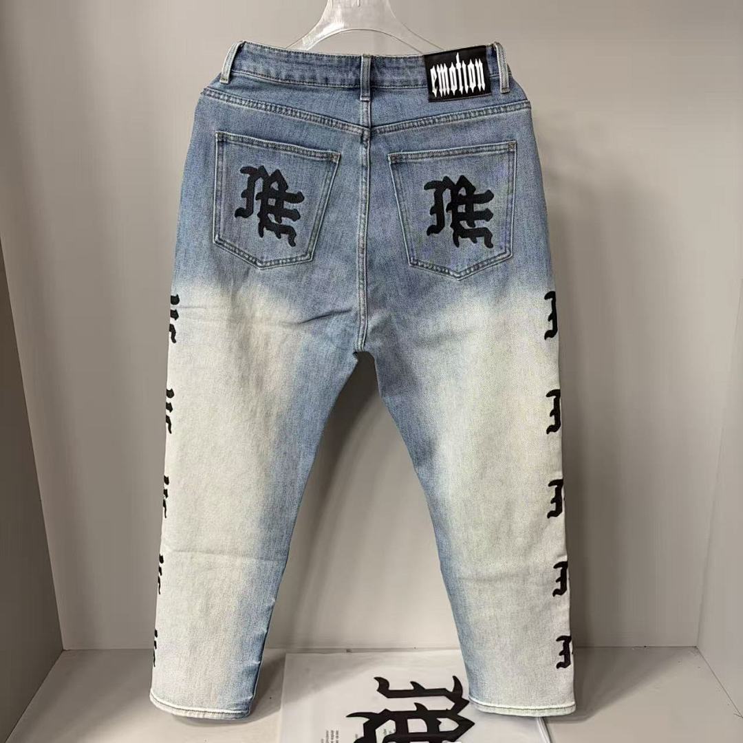MIXED EMOTION Repeated Letter Side Graphic Jeans