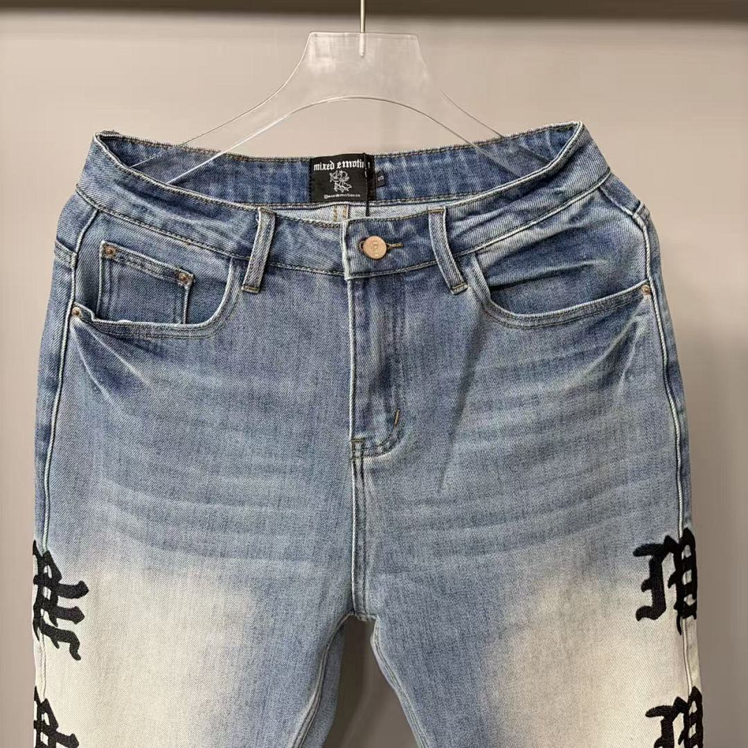 MIXED EMOTION Repeated Letter Side Graphic Jeans