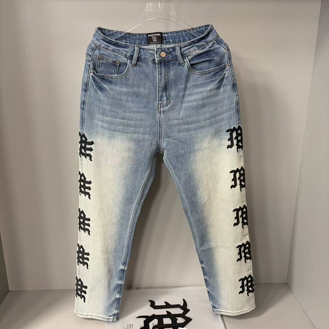 MIXED EMOTION Repeated Letter Side Graphic Jeans